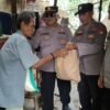 Air Mata Haru di Ujung Senja: Kapolsek Pebayuran Ulurkan Tangan untuk Pak Rasam Yang Sebagian Rumahnya Roboh